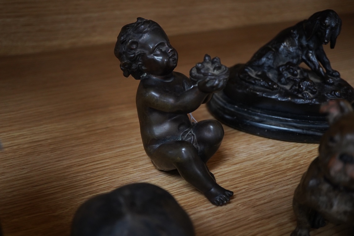 A small bronze of a of a hound and puppies after Louis Theophile Hingre (1832-1911), on marble base- 14.5cm wide, a painted bulldog ink stand, a putti and a fairy and two models of apples. (6).